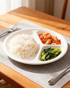 Compartment tray with rice and vegetables for a ready meal